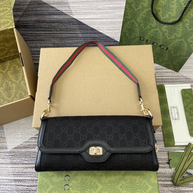 G*u*i satchel bags